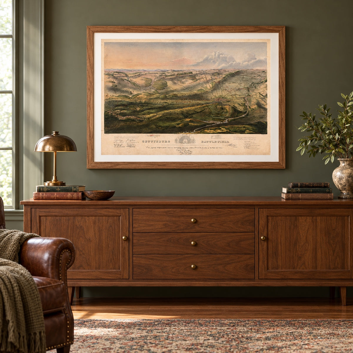 Gettysburg battlefield map in a Walnut Brown frame with a white archival mat, displayed above a wood credenza in a study