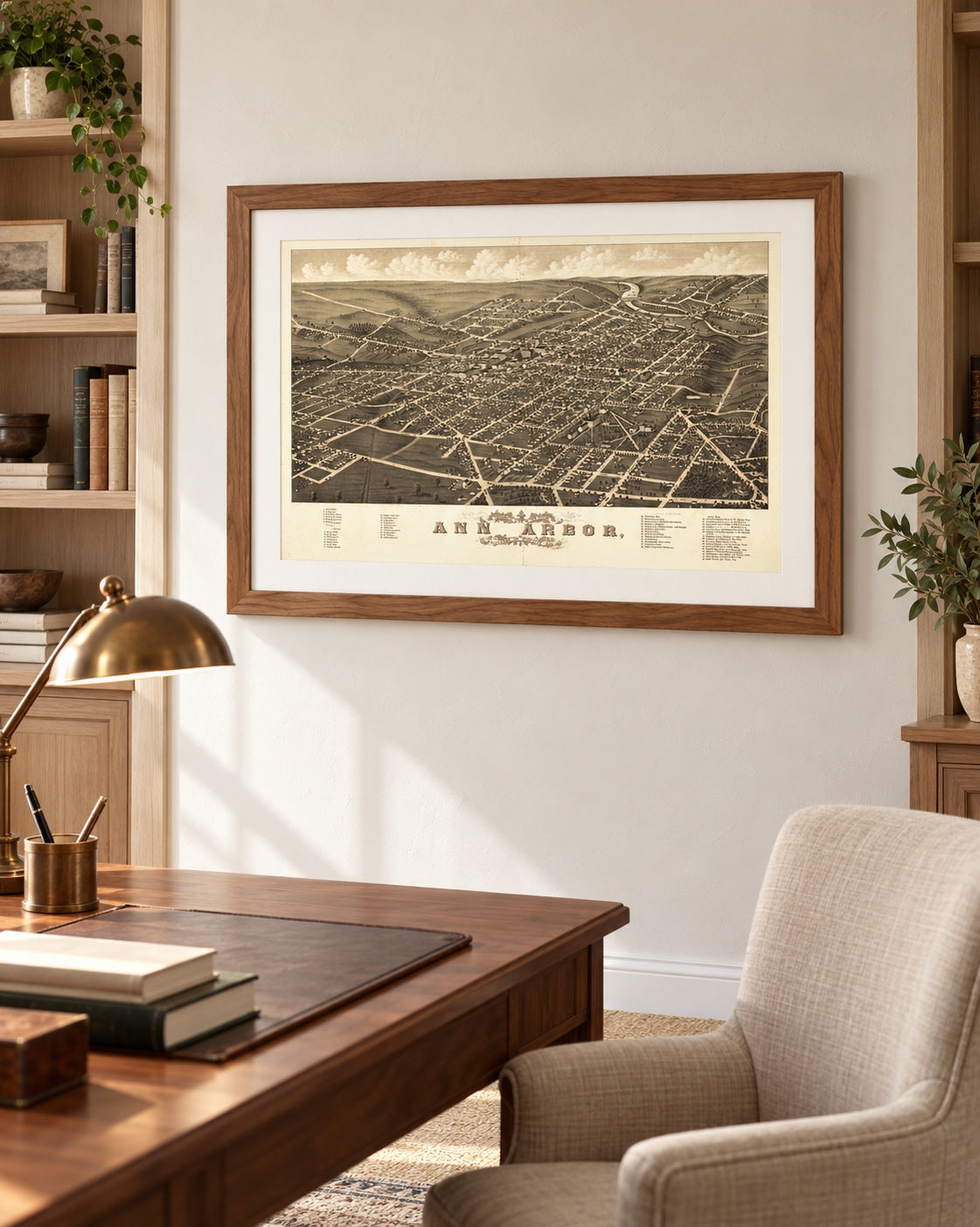 Ann Arbor, Michigan 1880 bird’s-eye view map in a walnut brown frame on the wall of a home office