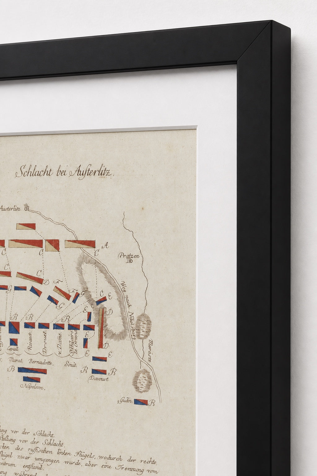 Battle of Austerlitz formation map in a black frame corner close-up with an archival-white mat.