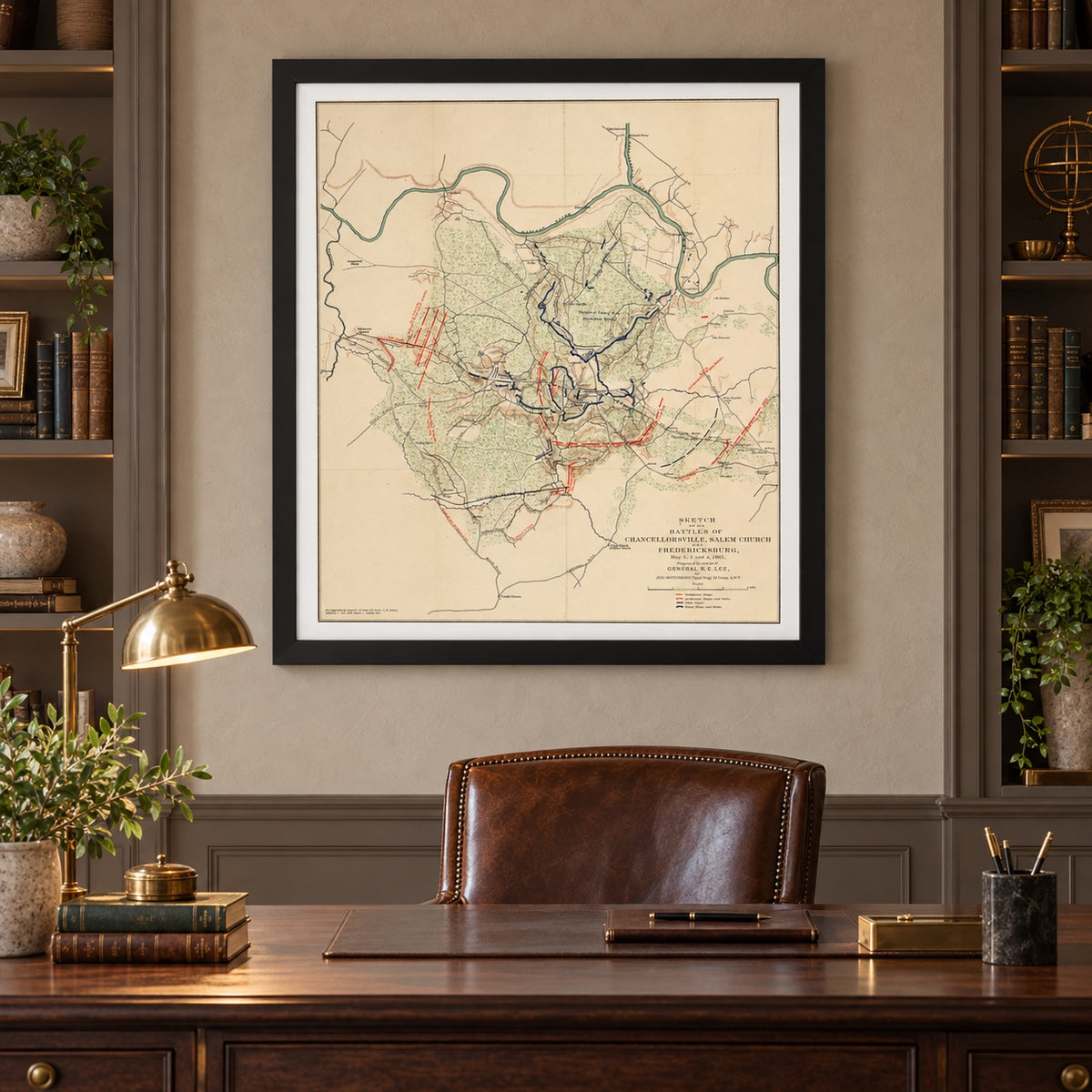 Chancellorsville 1863 battle map in a Black frame with archival-white mat, displayed in a refined executive office.